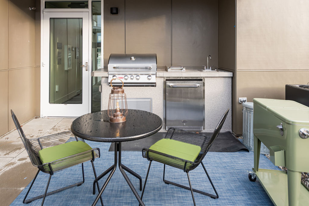 Grilling Area At Clark Apartments in Seattle, WA